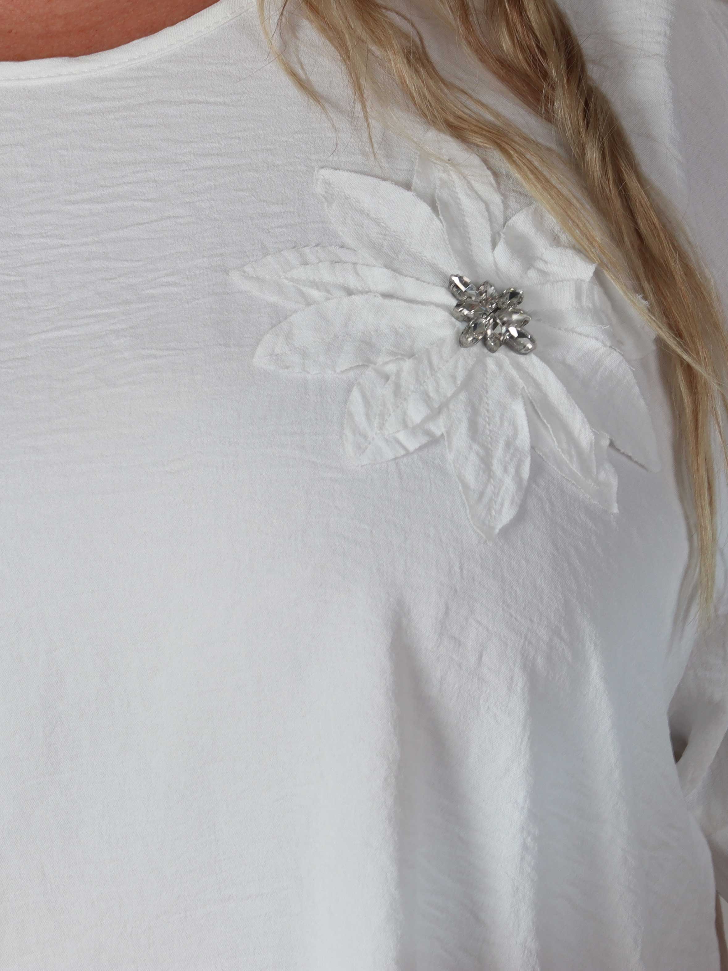 Tabisha - Plus size-tunika med blomma och strass på bröstet